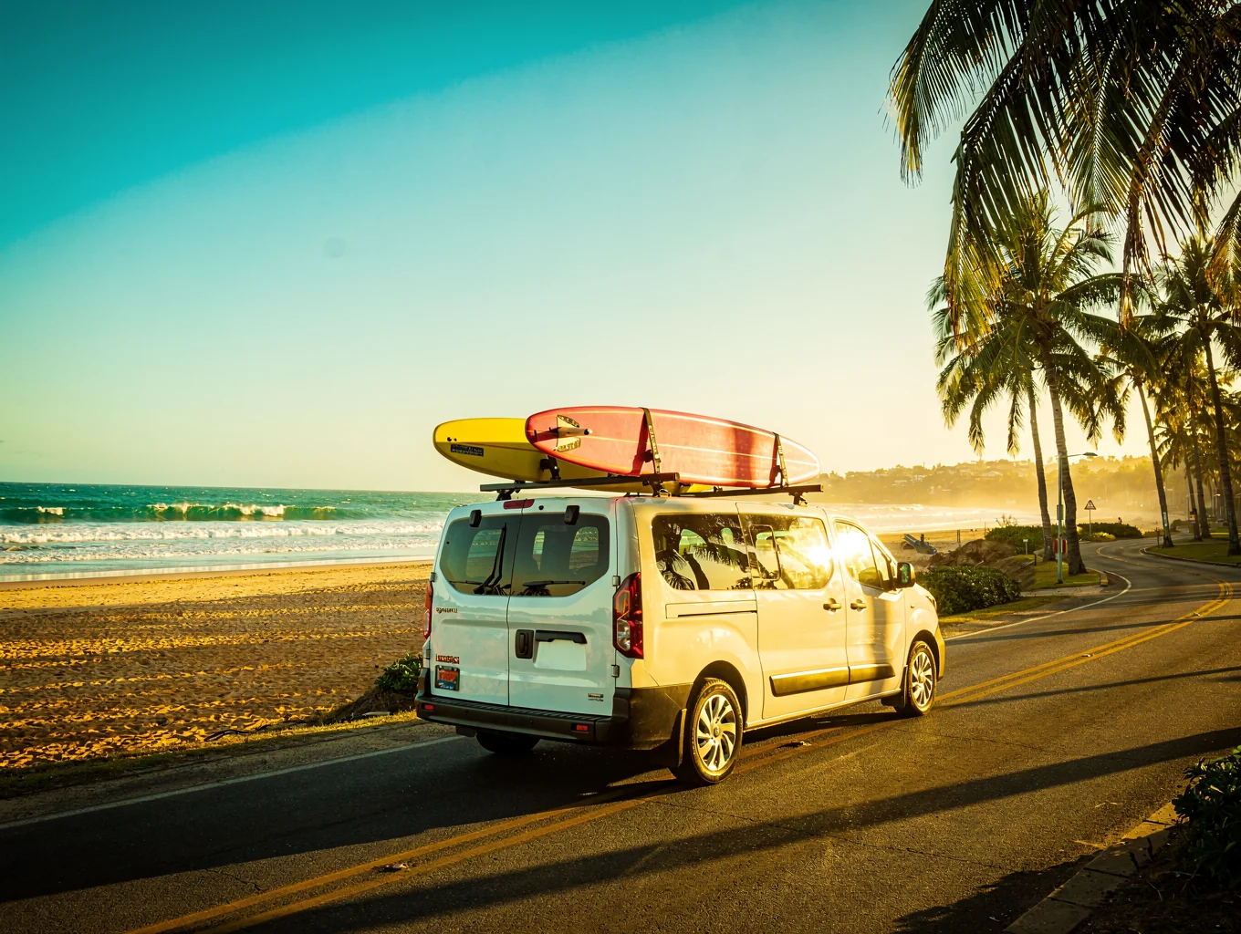 Private tour vehicle overlooking Cape Town coastal road and ocean horizon